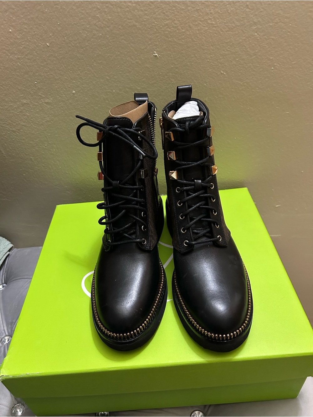 MICHAEL Michael Kors Black Leather Lace-Up Combat Boots with Gold Accents